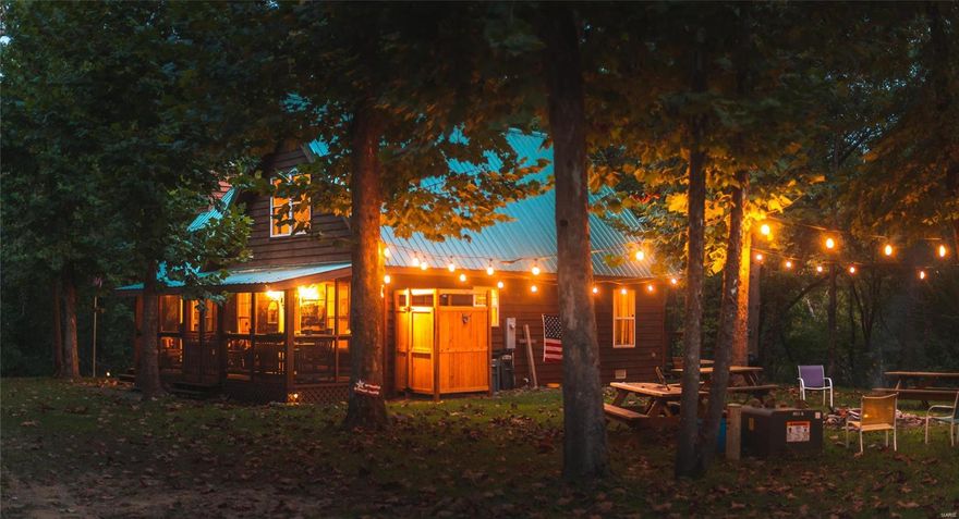 107 acres located in Pulaski county - truly the Paradise of the Piney river. Featuring over 1 mile of Big Piney river frontage, over 25 acres of lakes, & a high volume spring that feeds the lake. The final touch is a masterfully constructed rustic cabin in a perfect spot with views of the river & lake from the front or back deck. This property has a true park like setting with mowed walking/ATV trails throughout the scattered timber. Deer & turkey are an everyday sight feeding in the open pastures daily. Neighboring properties are separated from the property by a government railroad track that excludes commercial use and is maintained for government shipping in emergencies. Property is located less than 5 minutes from shopping/restaurants & hotels but is still secluded. Interior features of the cabin are wood flooring, open ceilings, a beautiful rock fireplace in the living area. This custom home was built with large windows accommodate river & private lake views from the comfort home.