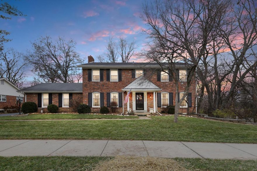 Stunning 4 Bed, 2.5 Bath, 2-Sty Home on .40-acre lot backing to wooded common ground! Meticulously-updated Main Floor highlighted by arched doorways & hardwoods throughout! Walls have been removed to open the space & create a beautiful flow. Large Family Rm offers FP & open views of eat-in Kitchen with high-end 42” cabinetry, granite countertops & SS appliances - gas range with custom hood & built-in microwave drawer. Spacious formal Living & Dining Rms; plus an updated Powder Rm! Upstairs, find more hardwood floors! Expansive Primary Suite with abundance of closet space, sitting area & en suite Bath. There are 3 add’l roomy Bedrooms & a beautifully-updated hall Bath. Finished W/O LL has large Rec Rm, 2 separate sleeping Rms/Office & plenty of storage space. The backyard is perfect for entertaining with 2 levels of hardscaped patios & generous green space backing to 16+ acre wooded common ground! Add’l features: custom-tiled staircase, rear entry garage & Award-Winning Parkway Schools!