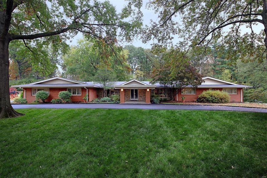 Architecturally stunning and impeccably maintained mid-century modern for sale for the first time since the owner built the home in 1965. This spectacular 4,500sf home on nearly an acre in desirable Ladue Estates is listed in the National Register of Historic Places. The home is designed w a primary 4BR/2.5ba area along w an apartment suite w separate entrance featuring 2BR/2ba, kitchen, living & dining rooms providing an ideal opportunity for extended family, office, or live-in nanny. Impressive entry with a pyramid ceiling opens to the living, dining, & great rooms w/ magnificent spaces for displaying artwork. The open floor plan, spacious rooms, and abundance of natural light blend the lines between indoor & outdoor living. The large kitchen/breakfast room & spectacular great room open to the screened porch and private fenced backyard w/ a kidney-shaped pool and scenic woods. 3,500sf LL. Award-winning Ladue Schls. Renovations may be eligible for MO Historic Preservation Tax Credit.