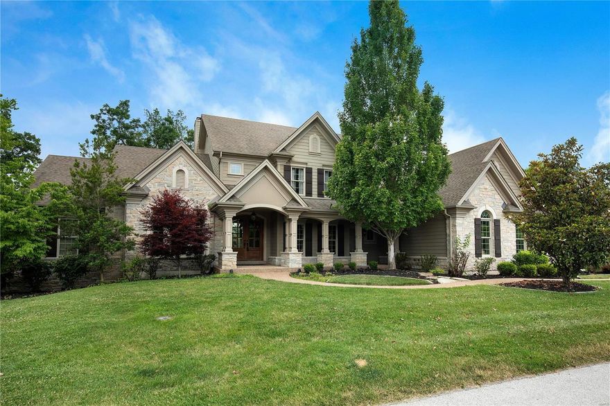 Come back for a second look, PRICED TO SELL well below market value! This breathtaking, former Hardesty display is situated on a gorgeous private lot perfect for a pool. Best value in Homestead subdivision with numerous custom amenities and freshly painted throughout. Study with custom millwork and built-ins. A generously sized dining room. Great room with wood floors, fireplace, walk-behind wet bar, and built-ins. Unbelievable gourmet kitchen with custom cabinetry, custom island, gas cooktop, built-in refrigerator, and granite island. A breakfast room and hearth room with stone fireplace. Main floor master suite with luxury bath. 3 upper-level bedrooms each with a private bath and a bonus room. Fabulous finished walkout lower level with media room, rec room, game room, fireplace and walk-behind wet bar, bedroom/exercise room, and full bath. This stunning home also offers a screened porch, deck, an incredible outdoor stone fireplace, and so much more!