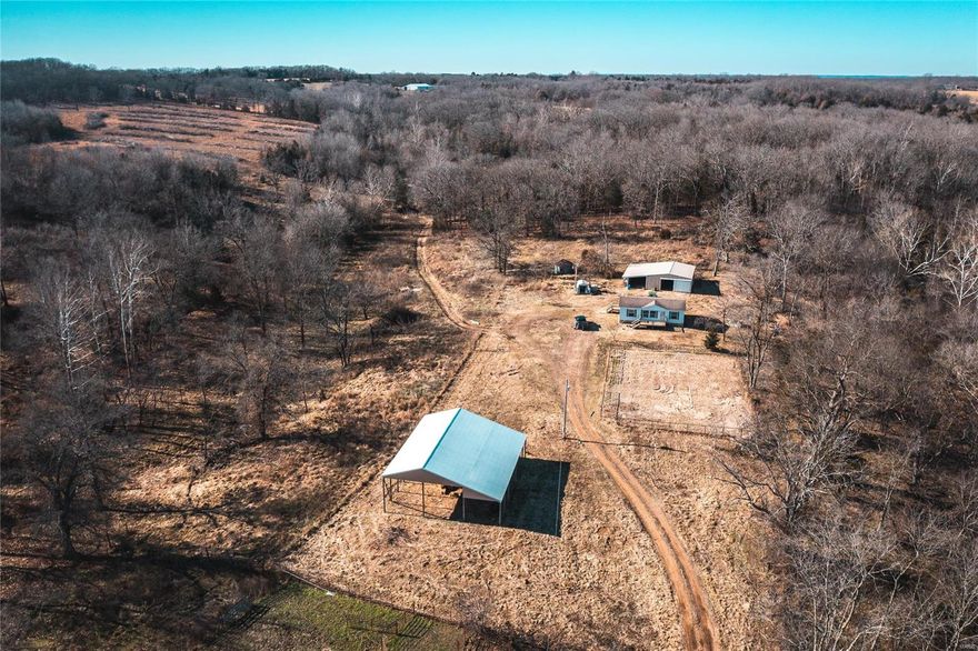 Find your happy place with this 267.94 acres m/l encompassing 5 tracts! Great for livestock, and has some bottom land that would be great for tilling along the creek. This property features 3 automatic waters for livestock, 3 wells, a 3 bedroom double wide mobile home on permanent foundation manufactured approximately in 2005, 5 stall horse barn, 30x56 m/l shed with 16' lean to, and other sheds with roughly 60+% open pasture. On the northern tract there is 1 spring.  Portions of the property are in the Rolla School District, and other in the Maries R1 (Vienna) school district.  All this only minutes from Rolla! Don't overlook the great wildlife on the property. Deer and turkey galore with nearby row crops planted! Act quick opportunities for land like this don't come around often.