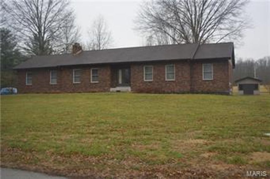 This home is owned by Mr. and Mrs. Meticulous.  Many maintenance and update records are attached as additional documents to this listing, be sure to ask your agent for a copy.  New Septic and drain field in 2004 which has been maintained and inspected annually by King Septic. New quartz counter top installed in 2016 along with new recessed stainless steel sink with faucet.  All light fixtures and ceiling fans on main level were replaced between 2013-2016. Plus much much more.  This home is conveniently located just a couple of miles outside of city limits of Festus. Served by Festus Fire Depart (Fire tag required). The level yard and large shade trees add privacy and comfort year round.  The back yard is large enough to add a detached garage If you wish, or an in ground pool (septic is in front yard, of course recommend a survey to verify easements and or setbacks prior to installing a pool).  Lots of room for a get together picnic, family reunion or party in this huge back yard.