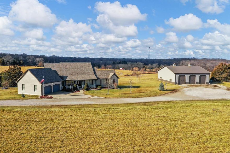 Rare opportunity! Own your own private country estate featuring 57+ acres! This property has it all. Custom-built home, with a pole barn, fenced for horses or livestock. Small horse barn and pond, a lean-to and 2 sheds are all located on the beautiful unrestricted property. The land is on 3 separate Tax ID's the first, the home and 3 acres, the second is 1 acre with a 2nd residence or commercial office space. The 3rd and remaining acreage is zoned for agriculture. As soon as you enter this stunning home, you’ll see the massive floor to ceiling wood burning fireplace! Primary bedroom has beautiful French doors and coffered ceiling. Primary bathroom has a separate shower and whirlpool tub! The massive living room opens to the kitchen complete with custom cabinets, walk in pantry, granite countertops, stainless steel appliances and a convection oven.
Large laundry/mud room finished lower level with full bath and 2 additional bedrooms (sleeping quarters) and a large open living room. Additional Rooms: Mud Room