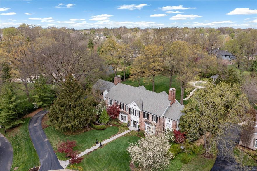 Introducing a distinguished Georgian Revival estate, a masterpiece by renowned architect Gale Henderson. This meticulously maintained residence sits on a sprawling wooded lot of nearly 2 acres, offering an unparalleled sense of privacy & serenity.
Soaring ceilings thruout. 7 bdrms and 6 full bath. Impressive entrance hall w/ a vestibule & inlaid marble floor. The main flr showcases expansive rms w/ Vintage Herringbone hardwds, leading to a Modern kitchen equipped w/High-End finishes & contemporary amenities. Stunning staircase leads to spacious primary suite boasting a Frpl & Lux newer his/her baths, & ample closet space. The 2nd flr offers 6 add'l & laundry room. 3rd floor bonus room. Spacious LL w/ original knotty pine paneling, coffered plaster ceilings, FAM RM, a rec rm, exercise area. 4-car gar. & gorgeous pool area. This timeless residence seamlessly blends historic charm w/ modern amenities.  Embrace the opportunity to own a home of unparalleled elegance & sophistication.