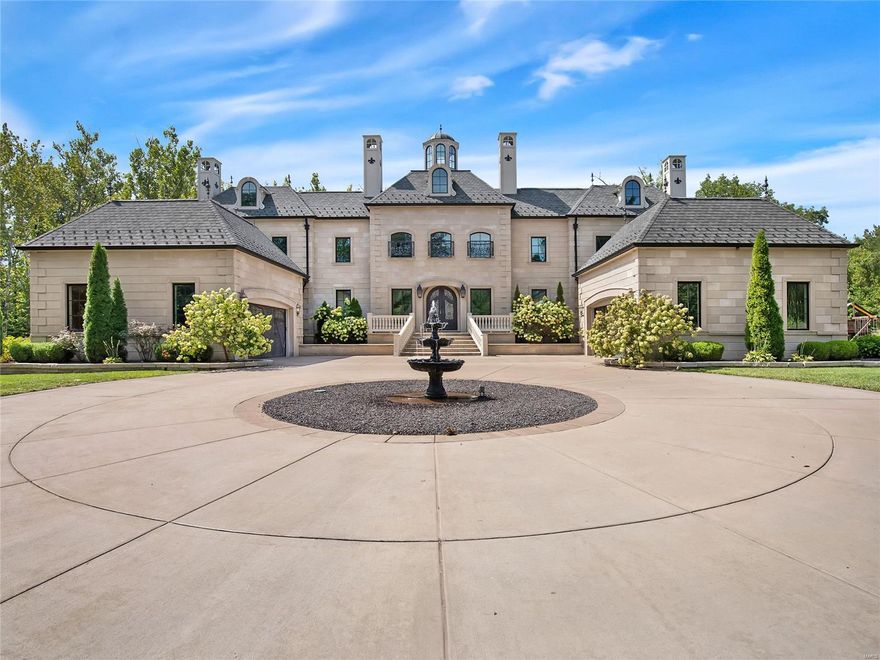 Have you ever seen a home this stunning? The exterior is elegant and impressive. This modern French Chateau is bold and luxurious everywhere you look. You will feel royal as you step through the front door with the duel sweeping staircases and rotunda tower. Huge kitchen & hearth room are perfect for entertaining large groups of family and friends. Step outside to your attached loggia a perfect spot to sip your morning coffee before work. 1st floor master suite with spa like bathroom and custom walk in closet. Upstairs bedroom suits with direct access to baths. 12ft walk-out basement feels like an entire home of itself with full kitchen, 500 bottle wine rack, top of the line movie room, gym, hidden TVs, and timeless finishes. Enjoy roaming on your 4+ acre lot and then cool off in your pool. His and hers garages, walk in pantry, mud room, butlers pantry, and planning office. Close to wine country, 100M dollar Augusta development coming, and just 15 minutes to Chesterfield Valley. Additional Rooms: Mud Room