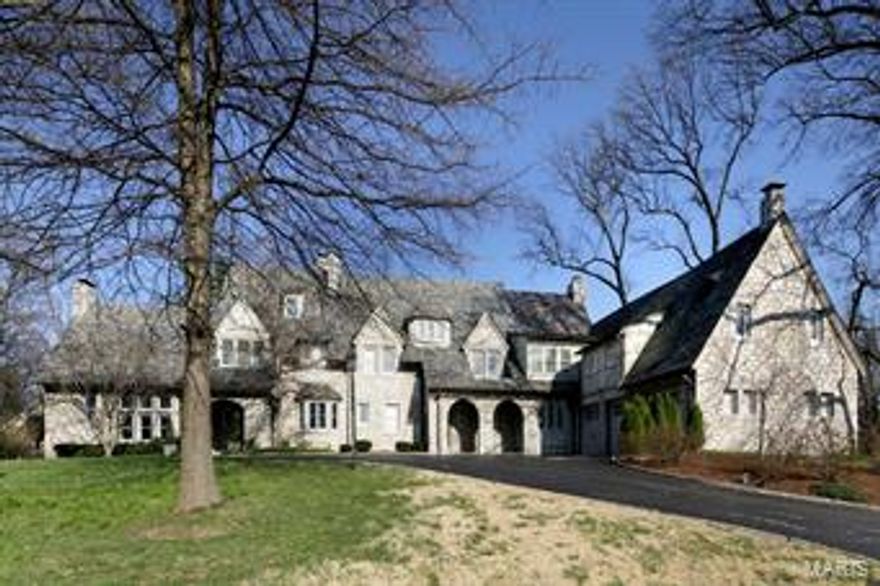 Photos do not do this beautiful, unique home justice!  Imagine stunning old world architecture meets modern day and that is what you'll find in this stunning and special English Tudor home.  The original stone home has been magnificently expanded and completely renovated to maintain its original grandeur yet offer new, generous open living spaces for today's living.  The expansive sunken living room with soaring vaulted beamed ceiling, built ins and large detailed fireplace only hints at what awaits you.  The large modern, custom kitchen which boasts top of the line cooktop, refrigerator, and warming drawer opens on one side to a large great room w/wet bar, ice maker and an extra dishwasher while the other side is the breakfast room w/another wet bar and built in fridge original to home. Gorgeous master bedroom and bath, four additional bedrooms and full baths on 2nd and 3rd floors as well as a sitting room and fantastic rec room w/a fireplace, a full bath and a separate entrance! Additional Rooms: Sun Room