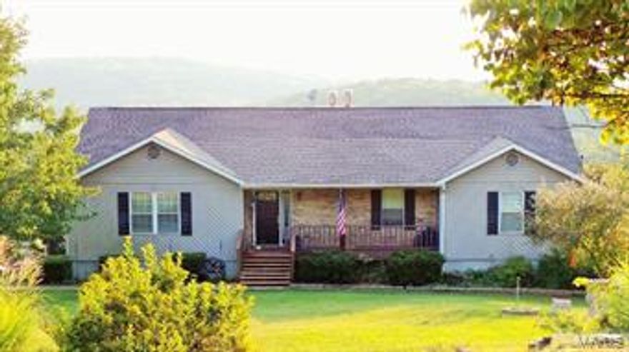 Breathtaking View!!!  From the moment you enter the gates, you will see this private paradise.
This home features 3 bedrooms, 2 full/2 half baths on 7+\- acres.  As you enter the front door, you’ll see the den on the left.  A few steps more and you’re in the wide open floor plan of the great room with a fireplace, skylights and the kitchen with a center island, custom cabinets and appliances that will stay.  Venture down the hall and you’ll find the master suite and 2 additional bedrooms.  The spindle staircase puts you into the rec area of the lower lever along with another all purpose room.   You will be in awe with the oversized multi level deck for entertaining and a brand new architectural roof.  This house has much, much more.  The only thing missing is YOU! MOTIVATED SELLER.