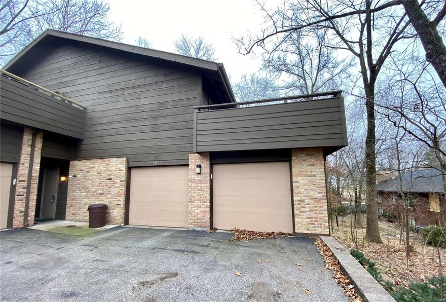 Incredible opportunity to grab this unique townhouse condo. Birnhamwoods complex is a wooded paradise, with trails and wildlife in a convenient mid county location. Main level has an open floor plan, newer wood floors in living room, dining room, updated contemporary kitchen and a tremendous deck that overlooks pool and tennis courts. Master bedroom (used to be 2 bedrooms) is an awesome space with an impressive closet. Master bath is in original condition. 2nd bedroom, and an original hall bath complete this level. The lower level: carpeted family room, brick fireplace. Lower windows have plantation blinds. There is a  lovely updated contemporary half bath and an office and mudroom area. There's newer HVAC and water heater. No seller's disclosure available. Unit needs finishing touches. See www.birnamwoodcondos.com for more neighborhood information. Contract requested is a Special Sales Contract. Unit to be sold "as is". Offers to be presented on 1/18. Make response time 1/19. Location: End Unit