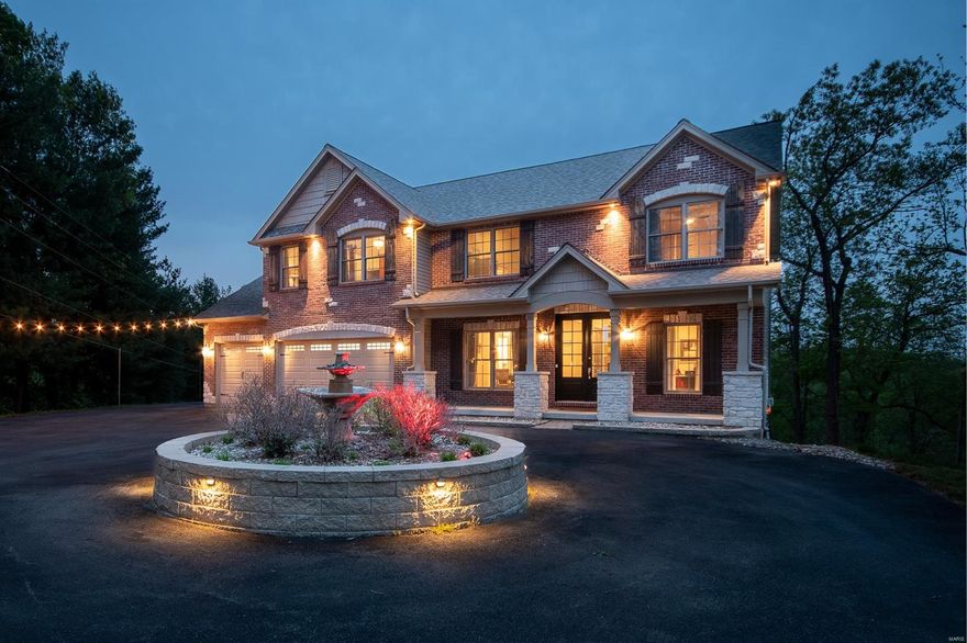 Enjoy today's conveniences...plus a private retreat! Here it is, on Hillsboro Road. Cruise past horse farms, woods & a winding creek to this magnificent 11 year old home with a gated circle drive. Enter the double doors and view the 9' ceilings, convenient office, & dining room with coffered ceiling. The lovely living room leads you to a top of the line kitchen with a large center island, SS appliances, custom cabinets & adjoining hearth room. Step out to the deck & take in the incredible view of the salt water pool & 5.5 wooded acres! 3 bedrooms, vaulted family room, laundry & luxurious master suite complete the 2nd story. A neutral palette & luxury vinyl flooring flow thru the home. The walk out LL has a theater room, rec room, sauna, work out area, & an add'l bedroom & full bath. Walk out to the hot tub, patio, pool & grilling station. A perfect oasis for gracious entertaining! Geothermal heating/cooling, roof 2021, 3 car garage, coveted Rockwood Schools! Washer/dryer included. Additional Rooms: Mud Room