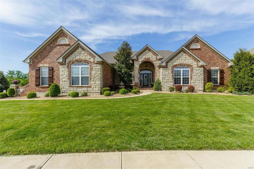 HOT NEW PRICE! Seller wants a CONTRACT!Live in this Cottleville Gated Community. A Grande English Manor w?Over 4800 Sq Ft of Living Space. Built by Byrne Custom Homes. Step Inside this Stately Masterpiece & Prepare to be Wowed.12 Ft Ceilings in the Great Rm. Gas F/P, Built In Book Shelves. A Beautiful Wall of Windows across the Back w/Transoms over the Top & Grills in Windows.Triple Crown Molding, Columns in the Dining Rm w/Picture Frame Molding. Enjoy Cooking in this Gourmet Kitchen w/Jenn Air Gas Downdraft Cooktop, Granite Countertops, GE Profile Double Oven, Scattered 42"Cabinets w/Roped Molding, Under Cabinet Lighting, Sun Rm, Bonus Rm, DEN, Master Suite w/Coffered Ceiling, Recessed Lighting, Surround Sound Speakers, ADT Alarm w/3 Camera's  MFL w/extra Cabinets, Finished Lower Level.Media Rm w/High Dif Projector, Stereo & Dolby System Stays, 2nd F/P, 2 more HUGE Bedrooms, Wet Bar, Invisible Fence, Surge Protector added to the Electric Box.Admired by Many BUT could be Owned by YOU! Additional Rooms: Sun Room