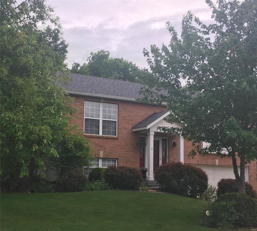 Best price in the neighborhood! This split foyer, 3 bed 2 bath brick front home is a gem! You'll love sitting on the back deck in your own little sanctuary surrounded by all the gorgeous landscaping and mature trees!  It won't take much and you can have a full fenced back yard! First floor boasts vaulted ceilings, a kitchen with tons of cabinets and counter space that opens directly into a very nice size dining room, all with ceramic tile. Large living area with a full bath and 2 bedrooms all on the first floor!  The lower level has a large 3rd bedroom that would make for a great master! Second bathroom and laundry also on lower level.  Home has some updates including 2 year old roof and newer AC/Furnace.  If you don't want to spend your nights sitting on the back deck, then head down to the lower level where you can sit on the patio enjoying a cozy fire or swing the night away on the porch swing. This home WILL NOT LAST LONG. YOU will want to be the one that calls this one HOME!