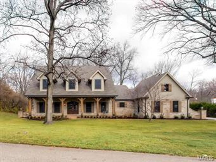 New, 5,044 sq/ft, 4 Bed, 4 full and 2 half bath, story and a half home to be built on large, .7 acre, level lot in Ladue. Main floor master suite with coffered ceiling, luxury master bath, and huge walk-in closets. High-end kitchen with breakfast room, large center island, Dacor appliances, walk in pantry, and separate wet bar area, opens freely to a wonderful family room with 12' box-beam ceiling, stone fireplace with hand-hewn mantle, and built-in book cases. Separate dining room and study with custom built-in book cases. Family foyer area off of the oversized 3-car garage has built-in cubbies and flows freely to an oversized laundry/activity/craft room perfect for computer stations, sports equipment, etc. Second floor has 3 beds and 3 full baths; 24'x16' bonus room, and additional laundry room. Outdoor living areas include a 10' x 43' front porch, as well as a rear covered patio with stone fireplace and stained vaulted ceiling. Act now to get in early and make your own selections. Additional Rooms: Mud Room