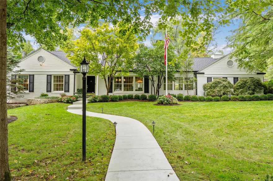 Welcome to this charming 4 bedroom, 4.5 bath home situated on a spacious .7-acre lot in the heart of Ladue. The main level features a luxurious master suite with his-and-her baths and a second bedroom that has been transformed into a generous walk-in closet. The home boasts a large living room, separate dining room, and office/den. The open-concept kitchen with a hearth room with 15ft ceilings and gas fireplace leads to a private backyard oasis. Upstairs, you'll find two more bedrooms with large walk-in closets and a shared bath. The lower level offers a bedroom, full bath, large laundry room, recreation room and ample storage. This beautifully landscaped property includes an irrigation system, landscape lighting, newer roof, newer HVAC systems, and so much more!