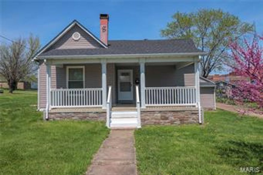 Absolutely move in ready!! This home is in tip top shape from the newer roof, siding, thermal windows, brand new breaker box and has monster sized bedrooms!  This has an open floor plan with a HUGE kitchen island.  The living room is where the wood burning fireplace w/blowers keeps you toasty in winter, but looks really great year round!  You won't believe the wall to wall closets, there is a vinyl fenced back yard and a drive through 2 car garage too!! This is truly a fantastic opportunity to own a lovingly maintained home.