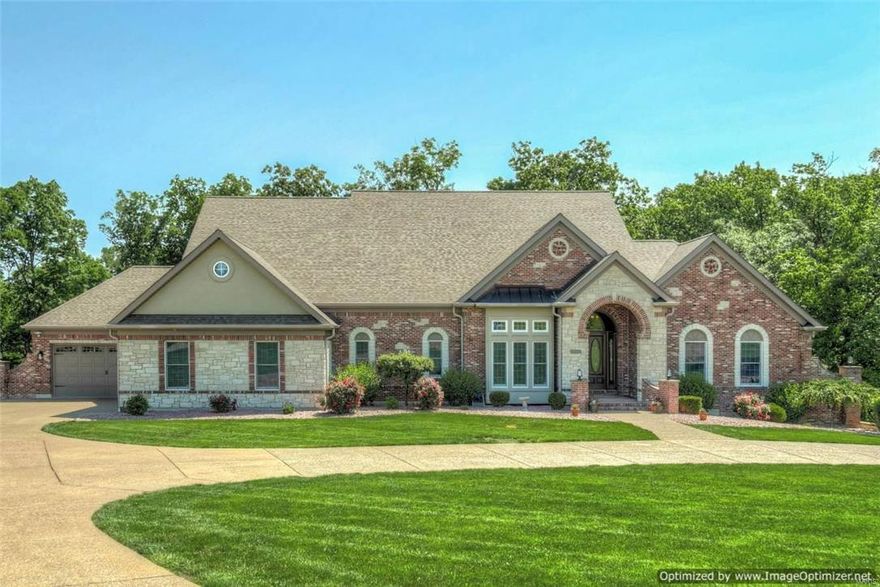 No stone left un turned in this amazing, truly custom upper end executive ranch, priced to move at hundreds of thousands of dollars below original construction cost. Highly efficient geothermal heating & cooling, unsurpassed quality & detail at every turn, ideal combined family potential with the walk-out lower level offering two additional bedrooms & baths, exquisite media room & family rooms, office, hobby room & fantastic bar all totaling an additional 3,000 sq. ft. of flexible living space. Icing on the cake is full service elevator for physically challenged loved ones. There is not nearly enough space to describe the just under 4,000 sq. ft. of main floor living. 10, 12 & 16 foot ceilings, dream gourmet kitchen, 5 fireplace’s, elegant hand scraped hardwood flooring, car lover’s dream garage all situated on a 3 acre, half wooded lot with impressive circle drive. Flawless!!!