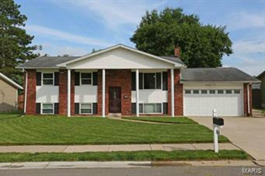 Beautiful 3 bedroom, 2 1/2 bath, 2 car garage home. Gorgeous hardwood floors throughout the main floor. Formal living room and dining room updated kitchen, 3 bedrooms and 1 1/2 baths complete the main floor. Lower level has a spacious family room with wood burning fireplace and ceramic title floors. Utility room, full bath and sleeping area in lower level. Level fenced backyard has large patio for entertaining and shed.