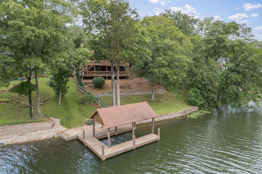 Pictures will of the inside wil be upload on Thursday.  You are going to Love this Lakefront Property!!! 3 Bedrooms, 2.5 Bath log home located on 2 lots on ski Lake Lac Lafitte.