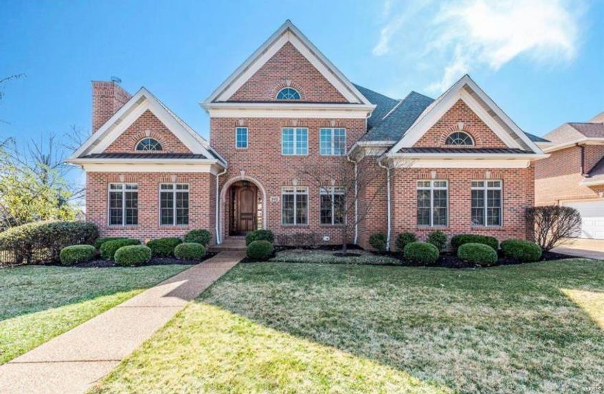 This elegant Clayton Gardens 1.5 story home features 5 bedrooms and 4.5 baths. The main floor has a 2 story foyer and great room with beautiful floor to ceiling windows, a den/office and a dining room with arched openings. The main floor master suite has a coffered ceiling, large walk-in custom closet, and spacious master bathroom. The light-filled eat-in kitchen has Viking appliances, walk-in pantry, breakfast bar, and hearth room. Upstairs there are 3 additional bedrooms, 2 custom bathrooms, and a second laundry room. Downstairs you will find a finished walkout basement with lots of windows for natural light, a bedroom & full bath suite, exercise or craft room and a large rec room. Entertain outside as this dream home is on a large corner lot with a gorgeous stone patio, 2 story deck with see-through fireplace, chandelier & TV! Walking distance to boutiques, restaurants, Clayton award-winning schools and Shaw Park. Additional Rooms: Mud Room