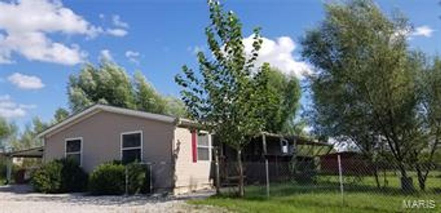 Take a look at this! Unique property has the features of a mini-farm. 4-stall Horse Barn Ready for any Animal with fencing and grass for grazing. But it could also just be a great home with plenty of land for your growing family to roam & grow. Just the right amount to mow plus a near park like setting in the woods... a place to reflect. Inviting covered Deck greets you around front for quiet solitude morning noon or night. Plenty of shade to take in the surrounding views. Enjoy the endless Hybrid Willow trees lining the property & defining the Walkout 2nd Access to Lower Level. With the circle driveway that's wraps around the property you could complete finishes in the lower level to provide a place for the teenager or Mother in Law. Home now boasts a NEW ROOF, NEW CARPET & a NEW WALK IN TUB in Master Bath with plenty of jets to comfort the muscles after work. Open Floor plan Kitchen, LR & Dining. Spilt Bedroom plan separates Master from bedroom 2 & 3. Weekend Showings Only.