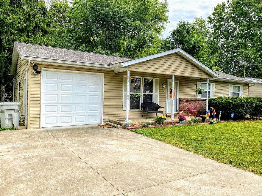 3 Bedroom 2 Bath with full finished basement located in Farmington Meadows subdivision.  Custom cabinetry in kitchen with appliances.  Main floor master suite with walk in closet, and laundry hookups.  Dining area.  Family Room and Bedroom located in lower level along with roughed in bath.  Attached and detached garage, with additional storage building.   Covered porch and covered deck with large, level, fenced lot.   Concrete driveway.   Gutter guards.  Tons of storage space.   This is worth checking out.