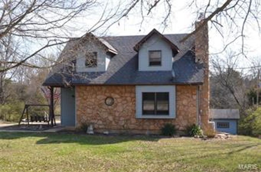 No showings till MONDAY 3-27-2017. Beautiful 1 1/2 story home on 1.5+/- Acre backs up to woods.  This house offers a wood burning stove on main level and a gas fireplace on lower level.  There are 2 large bedrooms on the upper level with walk-in closets and a full bath.  Main floor master bedroom and main floor laundry with additional hookups in the basement. Double hung wood windows, poured patio located off the side of home which connects to the large composite deck off the kitchen that leads to your above ground pool.  Lining and sand in-ground filter replaced 2015. Lower level patio is aggregated.  Septic replaced 2011 and cleaned 2017. More pictures to come Monday 3-27-2017.