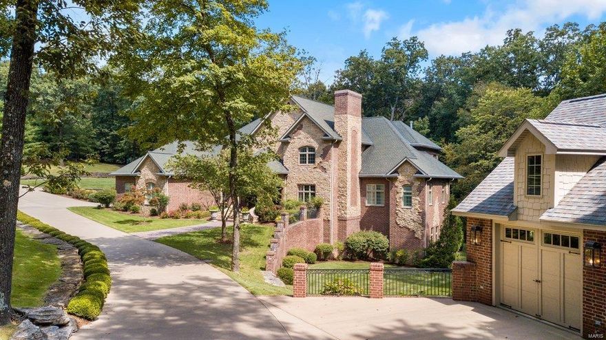 Nestled on 3 acres, in a peaceful, secluded neighborhood sits this luxurious estate- exquisite design, contemporary amenities, & finishes to the highest standard. 12,814 sq ft of luxury living boasting 7 bedrooms & 8 baths. CHEF'S KITCHEN: double island, beverage station w/ wine chiller & expresso machine, 2 convection ovens, 6-burner gas stove, 2 dishwashers, butcher block top/pastry station, Italian porcelain tile flooring; EXPANSIVE LIVING SPACES: soaring ceilings w/ wood beams, floor to ceiling windows, plantation shutters; RICHLY APPOINTED SPACES: 24 ft foyer entry w/ circular window & grand curved staircase, intricate wainscoting & molding- adorned dining room, study w/ fireplace, master bedroom suite w/ private IPE deck, marble shower, & arched entrances; LOWER LEVEL: reclaimed French Oak wood floors, barrel ceiling wine room w/ brick flooring, full kitchen w/ high end appliances, guest suite, state-of-the-art theater room w/ stadium seating for 16...THIS IS 139 FLAGSTONE DR!