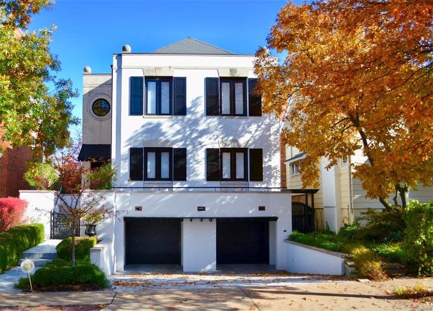 *New Price!*This outstanding custom Ellerman built home is desirably located in Old Town Clayton boasting wood floors, a stunning neutral decor, and updated throughout offering an open floor plan perfect for today's lifestyle! Main level features: two story entry with dramatic staircase, powder room, spacious living room with cross beam ceiling, fireplace & reading nook, open to the gourmet kitchen w/custom Crystal cabinetry, center island w/Danby Carrera marble countertop, top of the line appliances, dining room w/built-in cabinetry, butler's pantry, office, master suite with walk-in closet, his & her baths with stall shower & soaking tub. Second level offers 4 additional bedrooms, 3 full baths, laundry room. Walk-out lower level: recreation room, catering kitchen, mud room, half bath, storage. Additional features: elevator, 2 car attached garage, screened porch, patio, fenced yard. Walk to shops, restaurants, and enjoy living in this beautiful home and all that Clayton has to offer! Additional Rooms: Mud Room