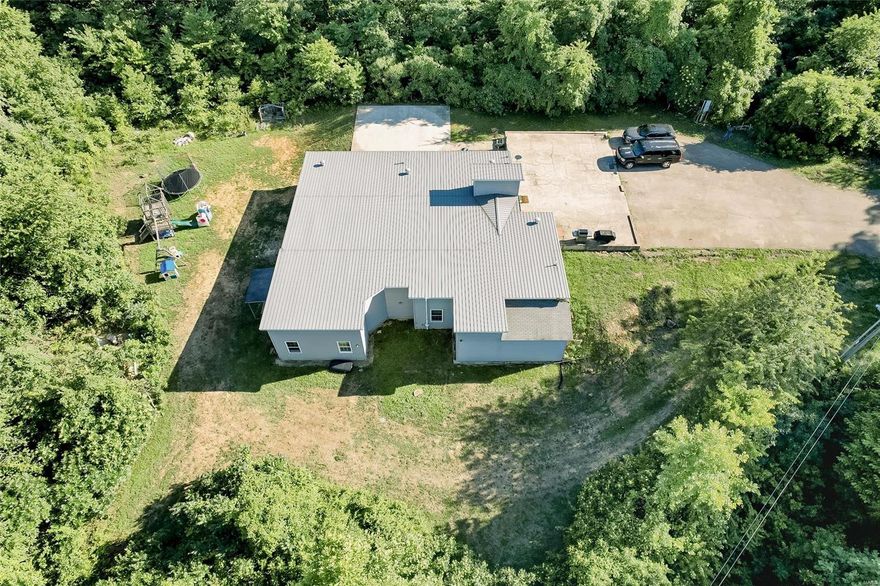 ENERGY EFFICIENT HOME!! This newly remodeled 3600 s/f home is perfect for someone looking to build their dream home! Live in the finished basement while building your forever home! An additional electric panel as well as the subfloor is all ready for the main floor to be built. Current owners even have the original floor plans! Sitting on 11 acres, near the 5,200-acre Boy Scout Ranch, with two stands already set up for you, there are fantastic hunting opportunities! This home conveniently sits just between Farmington and Fredericktown. With a blacktop driveway off Hwy 67, you’ll be close to the highway but nestled far enough back for privacy! Enjoy the benefits of country living with blackberry bushes right in your backyard, no restrictions, and plenty of room to explore all while being close to town! Whether you’re looking to build your dream home or the idea of an energy efficient home sounds wonderful to you, don’t wait to schedule a showing! Call today!!