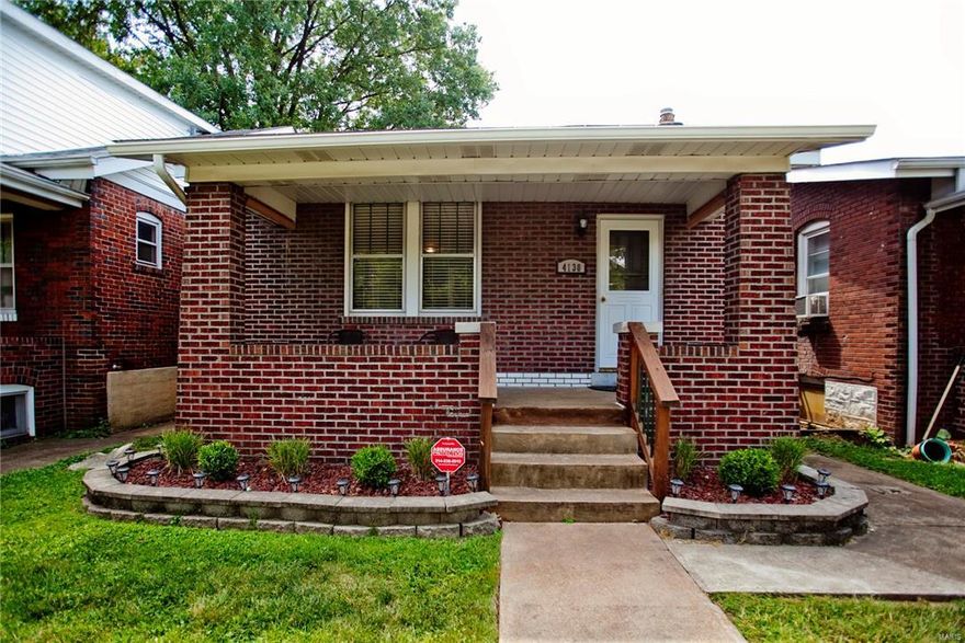 Must see this charming brick bungalow with tons of original features along with modern updates! Pristine natural woodwork throughout + original glass doorknobs! Beautiful living room with unique curved wall, decorative fireplace & mint condition stained glass windows. As you walk in the open layout gives the home a spacious feel . This home has been well maintained with newer appliances, ceramic tile flooring in kitchen and bath + a cute little window over the sink that looks out over your large back yard. There is an addition room off the back of the house that could be used as a 3rd bedroom or office! Roof was replaced in 2011, all new plumbing 2011, and AC in 2013. Buyers will also appreciate the updated kitchen, bathroom, fenced backyard, off-street parking & clean walk-out basement offering lots of storage.