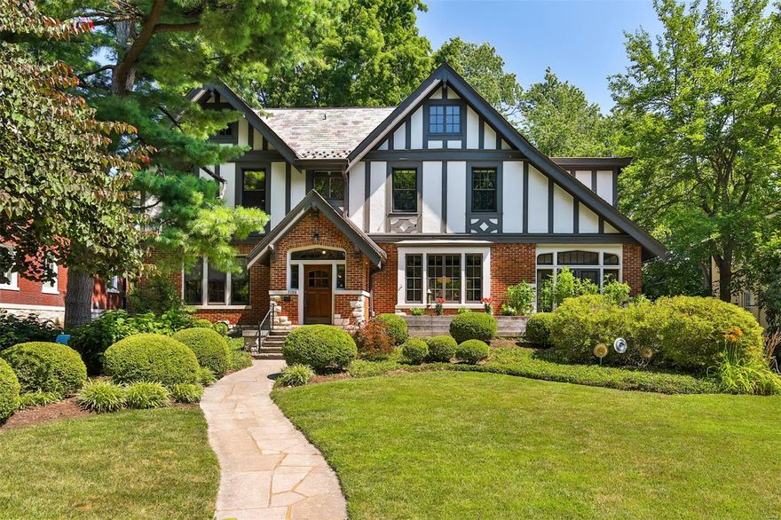 This grand Tudor-style home in beloved University Heights neighborhood is packed with timeless charm! Sprawling living room, with impressive Ernest A. Batchelder fireplace—a rare gem. Bright dining room flows into a beautifully updated eat-in kitchen (2020), featuring a spacious center island, ample cabinetry, & a stunning picture window. Just off the kitchen, the sunporch offers easy access to both the expansive front porch & the backyard, seamlessly blending indoor & outdoor living. A HUGE yard, with plenty of space for a future pool & still room to spare! The rooftop patio is your private escape—perfect for lounging & soaking up the sun. This home has it all! 5 bedrooms, 3+ baths, & bonus room. There’s plenty of space to spread out. Plus, its prime location just minutes from Clayton, Wash U, & Forest Park, means you're within walking distance to some of the best St. Louis has to offer. This amount of space is uncommon at this level of affordability. Schedule your showing today! Additional Rooms: Sun Room