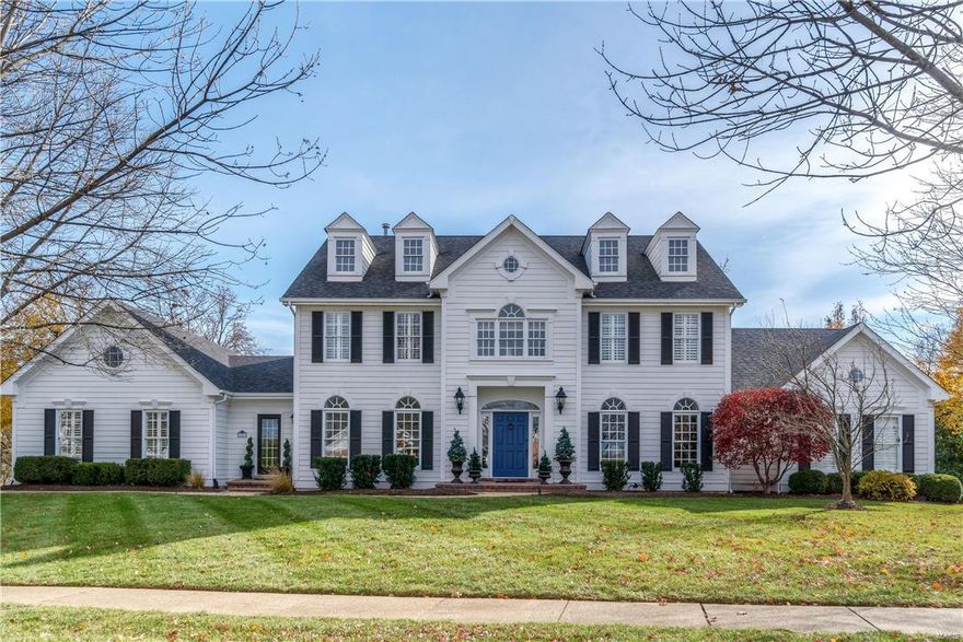 Picture Perfect Colonial with designer panache! Custom amenities & updates throughout including gleaming wood floors, extensive millwork, palladian windows & plantation shutters. 2-Sty hardwood foyer highlighted by dramatic flared staircase leads to private study with built-in bookcases, sophisticated dining room & spectacular great room with brick fireplace, display shelves & atrium door that walks out to paver patio. Chef’s kitchen with custom 42” white cabinetry, quartz countertops, commercial grade appliances & center island adjoins light-filled breakfast room with convenient planning center & vaulted gathering room. Sumptuous master bedroom suite provides an appealing retreat with sitting area, His & Hers walk-in closets & luxury bath with Jacuzzi. Front & rear staircases access 4 additional bedrooms with generous room dimensions plus Jack n’ Jill & hall full baths. Professionally landscaped .57-acre lot includes patio with pergola—ideal for outdoor entertaining--& 3-car garage.