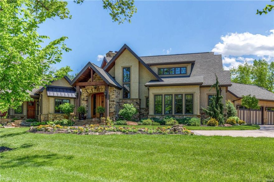 Custom-built 1.5 Sty with over 7400 sf of living space enhanced by hand burnt hickory floors, superb architectural finishes & energy efficient systems. Impressive hardwood foyer leads to library-paneled study, spectacular great room with stone fireplace & light-filled dining room. Exceptionally large kitchen features granite countertops, 42” cabinetry, professional quality appliances & Wenga wood island. A sumptuous master bedroom suite with marble fireplace & luxury bath, 2nd bedroom suite with private entrance & office with built-in work center complete the main floor living quarters. Open staircase accesses 2 additional bedrooms with Jack n’ Jill bath, bonus room & 2nd floor laundry. Walk-out Lower Level includes recreation room with wet bar, game room, workout room, 5th bedroom & full bath. Situated on a 1+ acre cul-de-sac lot with wrap around porch, pool & patio with stone fireplace. 6 Geothermal wells, cistern & extensive irrigation function to significantly reduce utility bills.