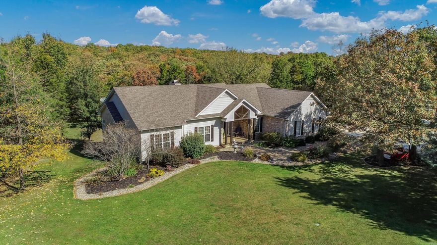 Simply stunning 27 acre gated estate that has it ALL! Remodeled 6000 sq ft, 5BR/4.5BA atrium ranch with open concept, spacious and bright with wall of windows and retractable skylight with weather sensors. Great room features massive stone fireplace with built-ins and soaring ceilings.  Gourmet kitchen is a chef's dream with large Quartz island and seating for 8, top of the line stainless steel appliances and Ilve italian gas range, beautiful custom cabinetry and ladder system. Main floor laundry and bonus laundry room on lower level.  Master bedroom suite with garden tub, sep shower, dbl sinks and 2 walk in closets. Finished lower level complete with pool table, sauna and custom bar.  Your horses will love their new home in the 3000 sq ft, 8 stall barn.  The family will love the two story clubhouse with zipline or relaxing by the 2 acre stocked lake with screened gazebo and dock. NEW Geothermal HVAC offers huge savings! Whether full time or weekend retreat, this is perfection!