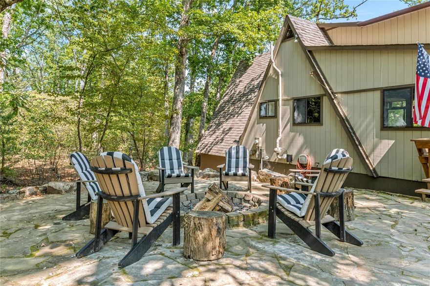 Discover an iconic A-frame chalet at Innsbrook, located near the Aspen Center, several Lake Aspen beaches, the golf course & more. This beautiful waterfront retreat boasts stunning landscaping & stonework & has been completely renovated recently, featuring a finished walk-out lower level, a brand-new open kitchen w/wine cooler and grand island; dining room & all-new baths. With 3 bedrooms + private sleeping area w/ensuite & large bunk/rec room in LL, this stunning chalet is designed for large groups to gather and enjoy. You'll love the convenience of the laundry & storage rooms, plus 2 charming firepits both at the chalet entrance & waterside. Plenty of parking & privacy; this chalet can be rented if the buyer desires. There’s so much to love about this property that's designed to "wow" and is move-in ready! While not included in the list price, some or all furnishings & housewares are available with a competitive offer to make for a turn-key opportunity.