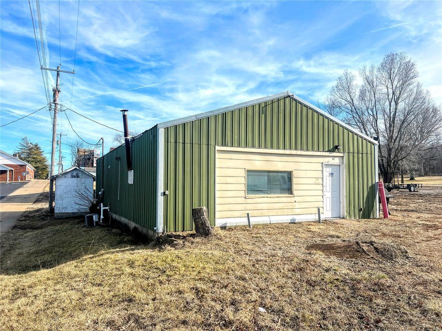 Discover the epitome of commercial excellence at 12 Fleming St, Leadington MO 63601. Nestled in the heart of the city, this 1836 sq ft metal building is a beacon of opportunity, surrounded by an array of restaurants, shopping centers, and banks. With a modern design and a convenient storage shed, it offers both functionality and durability. Its prime location ensures maximum visibility and accessibility for your business endeavors. Whether you're launching a new venture or expanding an existing one, this property presents limitless potential to thrive and prosper in Leadington's vibrant business landscape. Don't miss out on this rare chance to elevate your business to new heights and seize the moment and make 12 Fleming St your commercial sanctuary.