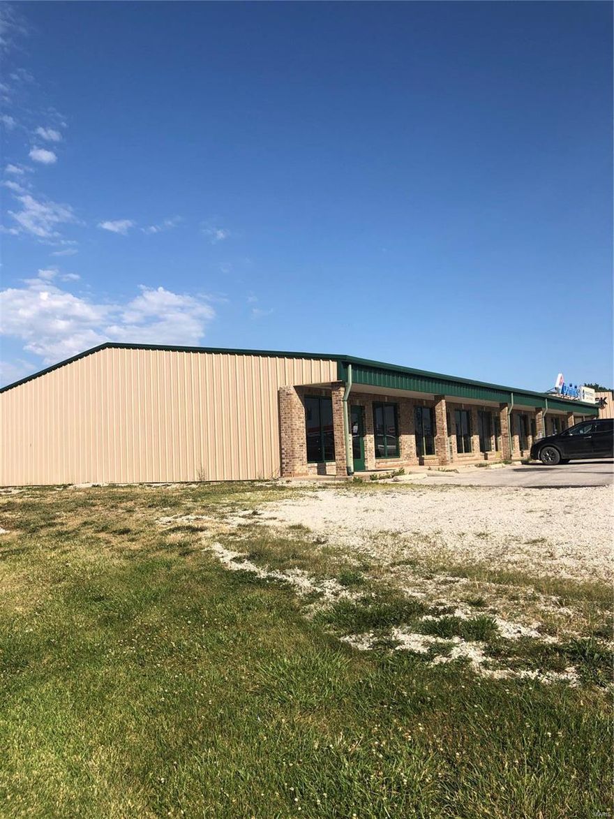 INVESTOR ALERT! FULLY LEASED STRIP MALL IN HIGH TRAFFIC AREA JUST A SHORT DISTANCE OFF I-70! Two one story steel buildings with brick fronts and steel roof have a combined 15,000 Square Foot of rental space plus a 35 x 24 storage unit.  Presently leased to several long term commercial tenants. Great Cash Flow Location: City, High Traffic
