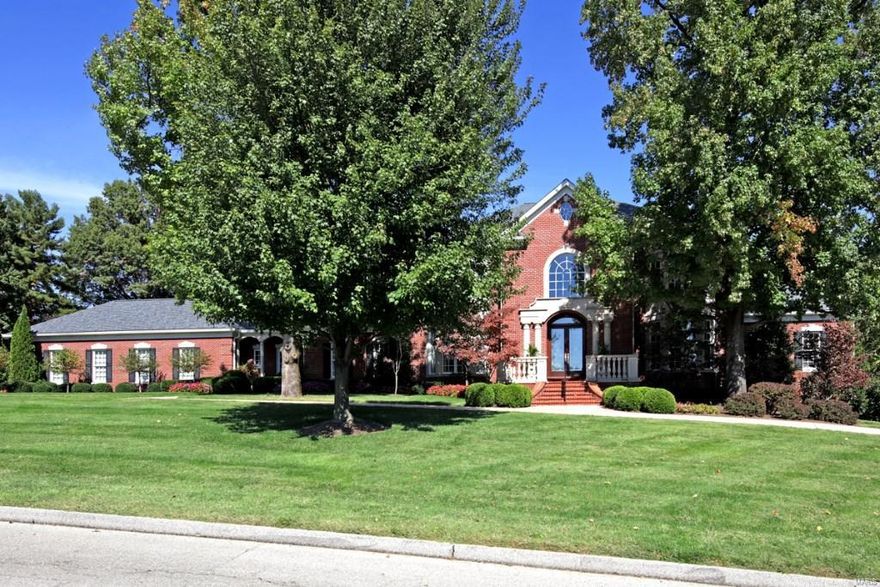 NEW PRICE!  $200,000 OFF ORIGINAL PRICE! Johnson built home on 1.8 acres. 7,600 Sq. Ft. 6 bedroom home plus finished walk out lower level & fabulous pool area. Grand foyer with center staircase.  Spacious rooms with 10' ceiling min., exceptional millwork & herringbone hardwood floors. Main level master suite overlooking rear terrace & pool. Adjoining luxury bath & dressing room. Additional main floor bedroom suite & study. Great room with 11' ceiling & sliding doors to pool deck.  Elegant living & dining rooms. Kitchen with Subzero, Thermador & Gaggenau appliances, double center islands-one with breakfast bar seating, 2 dishwashers, double ovens, pantry, office & breakfast room. Adjoining sun room with cathedral ceiling & access to pool deck plus full bath for pool. Main level laundry room.  4 bedroom suites on 2nd floor - two with a true Jack & Jill bath. Finished walkout lower level with bar/kitchen, fireplace, 9' ceilings & 2nd laundry room. 4-car garage & more. Additional Rooms: Mud Room, Sun Room