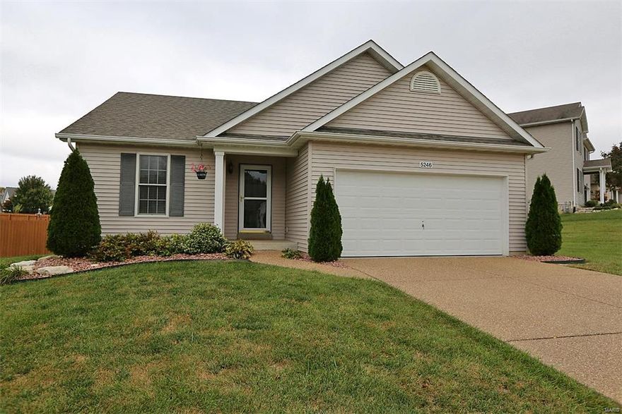 Beautiful Well Maintained & Updated Ranch in Stone Meadows Subdivision. Nice Open floor plan. Brand New Carpeting Throughout Main Level. Vaulted Great Room and Dining Room Combo, Woodburning Brick Fireplace w/wood mantle. Eat in Kitchen, White on White appliances, Custom Cabinets & Breakfast Bar opening to Great Room. Main Level Laundry with extra storage cabinets. Master Bedroom w/Full Master Bath complete with Walk in Closet. 2 additional bedrooms and Full Guest Bathroom. All Neutral colors throughout. Great Room walks out to Patio Area and  10,500 sq ft corner lot, plenty of space for Children or Entertaining Family. Vinyl Siding w/Soffit & Fascia. Architectural Shingle Roof. Upgraded Aggregate Driveway and Sidewalk leading to enclosed front porch. AAA Rated Wentzville schools within walking distance to house. Subdivision is self contained offering 2 swimming pools, Baseball & Soccer fields. Walking/Running Trail and Club House, Great place to live. Come See Today!!