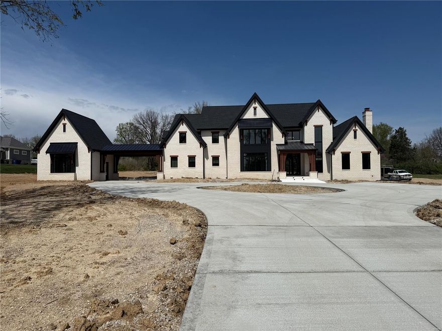 This TBB custom home boast a modern exterior with a 3 car side entry garage, designer kitchen with custom cabinets, Energy Star stainless steel appliances, a 36" gas range, granite counter tops, and a walk- in pantry. The spacious great room features a gas fireplace with wood mantel. The master suite includes a coffered ceiling and luxury master bath with adult height vanities, granite countertops, soaking tub and custom shower. The second floor provides three junior suites, each with full bathrooms and walk in closets PLUS a large recreation/ flex room. With stringent construction practice and attention to detail, Vanderbilt Homes will provide you with the quality and style you are looking for in your new construction home. This home is a to be built home; finishes, floor plans, and pricing may vary accordingly.