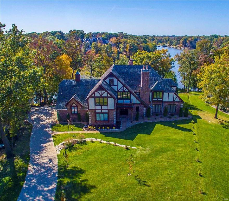 Coming Soon-new retaining wall, driveway, painting thru-out, light fixtures & more! Stunning & beautiful within a resort lifestyle! Gorgeous waterfront lot w/panoramic views! Lrg master suite w/fireplace, luxury master bath w/heated tile floor & 3 walk-in closets. Generous sized other bedrooms w/connecting Jack-n-Jill bath. Elegant marble 2 story entry w/T-staircase. Dining rm can accommodate lrg gathering. 2 sty great rm w/brick wall to accent fireplace & atrium window wall w/beautiful water views. Chef’s kitchen features HUGE ctr island w/granite, beverage cooler, arched brick wall w/inset gas cooktop, custom cabinetry w/inset premium appliances, butler pantry & ceramic tile floor. Finished walk-out lower level w/full bath, FAM/REC & fireplace. Walkout to the inground gunite pool, beautiful surrounding landscape, tree line open to gorgeous lake views. Enjoy the many amenities this community has to offer, golf, tennis, clubhouse, many activities thru-out the year! So much more to see!