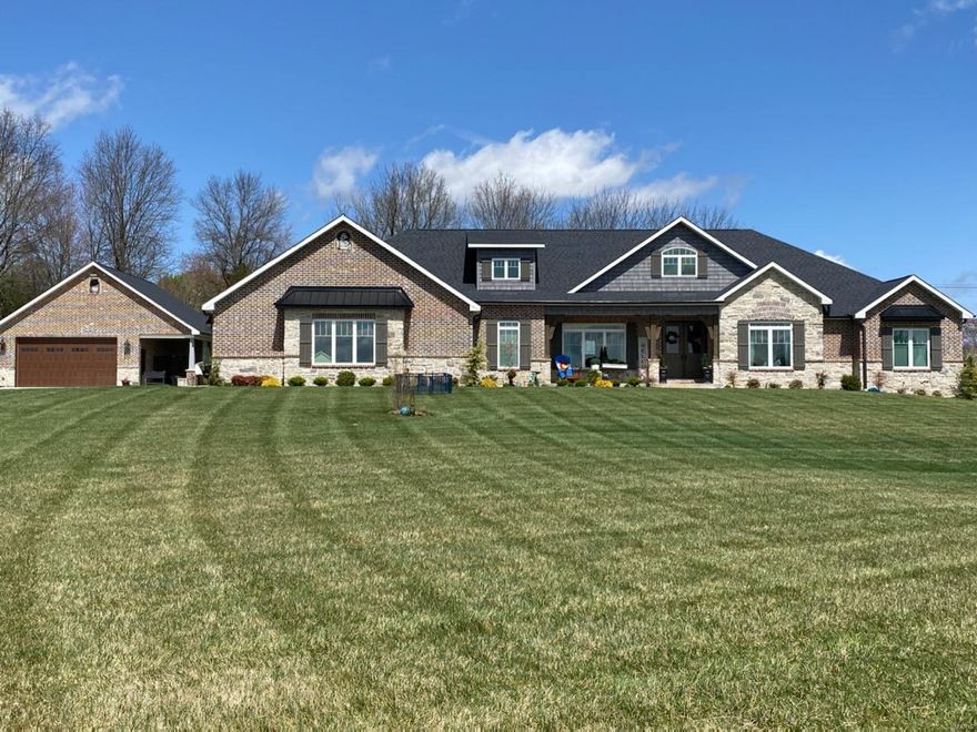 This two year old, all brick and masonry designer home sits on 2.15 acres and is just minutes from Cape and Jackson. Custom built, this home has many features and updates you won't find in other homes on the market. Boasting six bedrooms all with walk-in closets, this home has two fireplaces, a covered patio, a large mud room off the garage with built in cubbies, and a three car attached garage plus additional detached two car garage/shop. So much detail, craftsmanship, and elegance to experience in a stunning setting. Additional Rooms: Mud Room