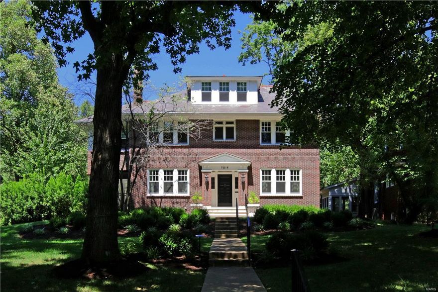 Everything old is NEW again in this fabulously reconstructed home that seamlessly blends original Old World charm w/stylish spaces for today's lifestyle. Entry opens to formal Dining & Living Rm w/fireplace & screened porch (17x9). The custom Kitchen & Butler’s Pantry w/designer finishes includes custom cabinetry, top-of-the-line appliances, granite counters, breakfast bar & laundry room.  New step down Hearth Rm addition (34x18), the heart of the home, with stone fireplace, beamed ceiling, 3 sets of French doors opens to an extensive stone patio.From the 2nd floor landing,relax on the outdoor deck w/fireplace & TV. Master Bdrm Suite w/ luxurious spa-like bath is a retreat featuring air tub,separate shower & double vanity, organized walk-in closet & sitting rm. 2 additional Bdrms, new Hall Bath complete the 2nd floor. 4th bedroom and full bath are tucked away on the 3rd floor. New 3 car detached garage w/fitness rm, zoned HVAC, irrigation system.  Walk to Wash U, Forest Park & Metro