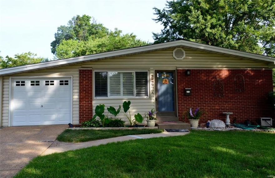 Welcome to 2425 Johnstown Drive!  Looking for an updated ranch with an open floor plan in a private setting?  HERE IT IS! This 3BR/1.5 bath ranch home w/garage & finished LL backing to trees is sure to please!  Huge Family Room opens to the kitchen/breakfast room, with the bedrooms on the opposite side of the home.  Tasteful decor in this well-maintained home includes neutral paint colors, updated lighting, plus beautiful plantation shutters in FR and Kitchen.  Kitchen has 42" cabinetry, beveled edge tile backsplash, smoothtop stove, built-in microwave, and pantry.  Exposed hardwoods in bedrooms, and updated bath vanity, mirror & lighting. This is a clean home!  Important updates and features:  Double driveway and large back patio with extensive landscaping (view of neighbor's yard is a bonus!); Vinyl siding & updated garage door plus storage area in garage; UPDATED HIGH EFFICIENCY HVAC (2014), New Water Heater (2015), updated electrical panel, updated plumbing stack. SEE IT TODAY!