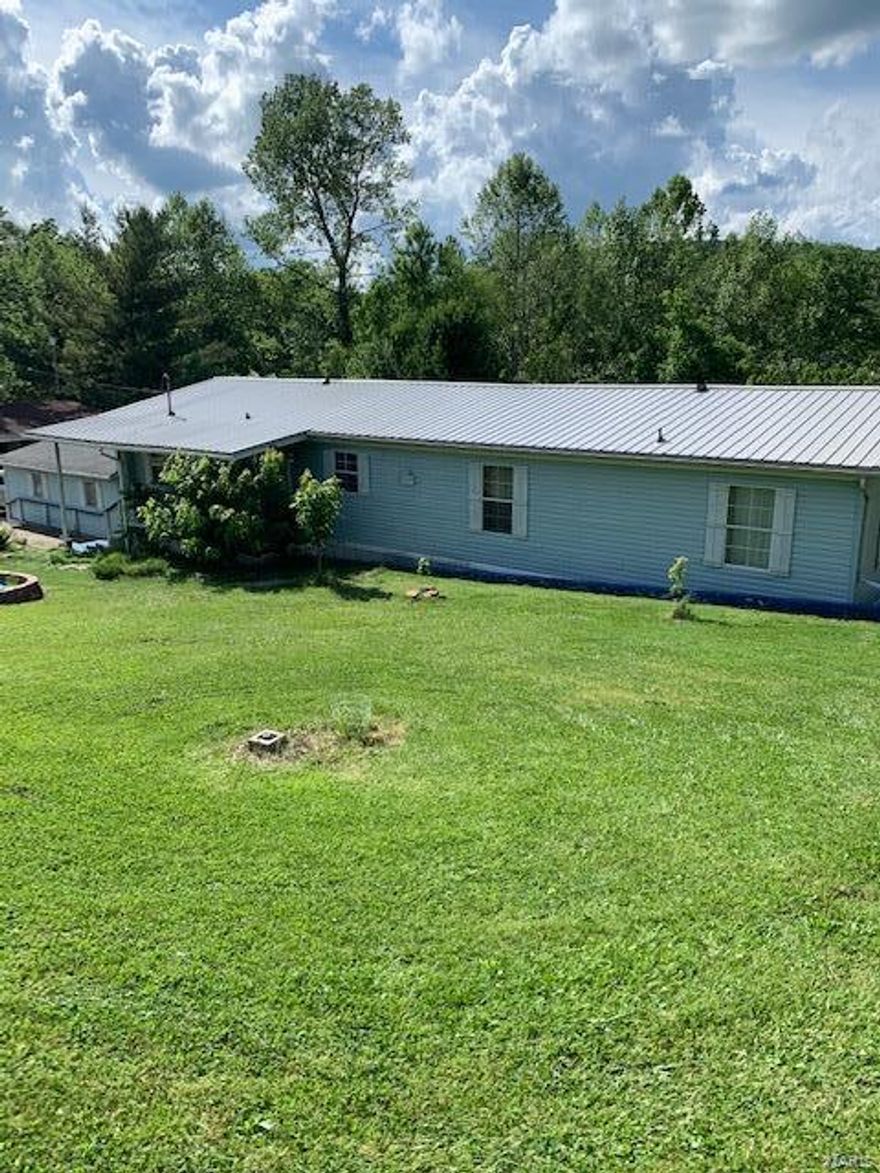 LIVE THE LAKE LIFE! Level water front double lot in Goose Creek w/2 car garage! Home is in good condition and has been recently painted with new flooring throughout. 3 bdrms 2 1/2 bath, large enclosed 11X19 Sun/Family room is a heated and cooled all season room. Main floor laundry, jacuzzi tub along with newly remodeled bathrooms. Home includes a ventless propane stovefor winter warmth. Newer metal roof. Garage is insulated and includes a workshop area. Organic peach and cherry trees adorn the backyard along with other herbs and plants organically grown. This can be a get-away home or used as a primary home to enjoy lake living! This home of course offers all of Goose Creek amenities including, lake access, public beach/pool, trails and more! This home includes all appliances, most furnishings, boat/trailer/motor. Additional Rooms: Sun Room