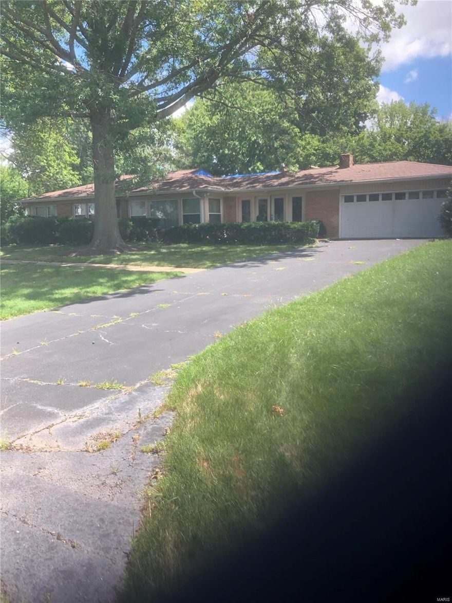 One acre teardown lot in Creve Coeur in tree-lined four home cul-de-sac Ladue Meadows neighborhood.  Attention builders, developers, and owner-users looking to custom build on this wooded level lot convenient to highways, hospitals, shopping, and close to both public and private schools.  Join other new homes already built in Ladue Meadows with several others nearby.  Opportunity to build your dream home in this close-in location.  Existing home is not being shown.  It is Ok to walk the lot with an appointment.  (DUPLICATE LISTING OF MLS # 19051304)