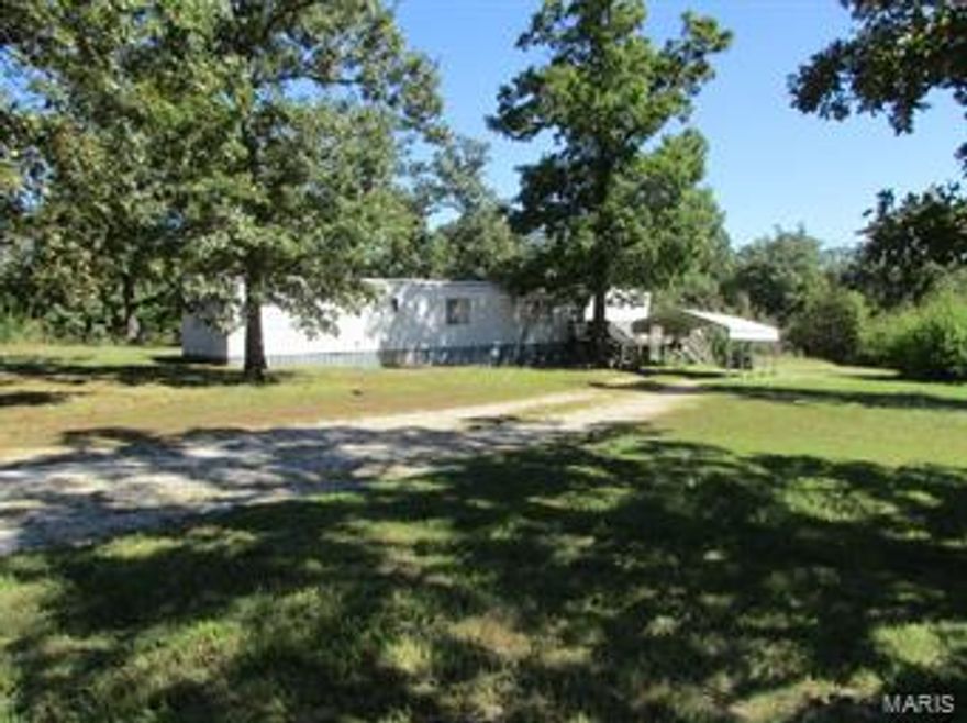 17 acres that lays very well and close to town. Would be a good place for a Subdivision. There are 2 trailers on property and two more hookups. Owner lives in the 1981 Trailer. Hwy frontage. Owner says there is some loggable timber. This could be Hunting land close to town with rentable trailers to pay the payment. PROPERTY AND TRAILERS BEING SOLD WHERE IS AS IS.