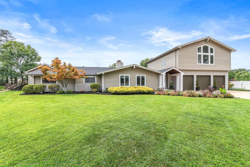 Stunning 4 bed, 3 bath, 1.5 sty in Harwood Hills Subdivision. Extensively updated/upgraded interior + pool! Dream kitchen w/ custom cabinets, crown, Viking appliances, subzero built in fridge, + u/c wine fridge, granite/butcher block counters, double oven, oversized island, pot filler, 3 sinks & custom tile splash. Designer lighting/plumbing fixtures throughout! Master suite w/ 2 walk in closets, luxury bath features his & hers private bathrooms w/ connecting oversized steam shower and jetted tub. Upper level features rec room, 4th bedroom & new bathroom. Exterior: Professional landscape, fenced yard, pool & your own putting green, irrigation, oversized 3 car garage & newer roof! Kitchen, flooring, plumbing/light fixtures, baths, and more all professionally redone. Large, bright, meticulously clean, professionally finished & it shows. Too many features/ upgrades to list. Great for family life or entertaining and within walking distance to St. Clement school.