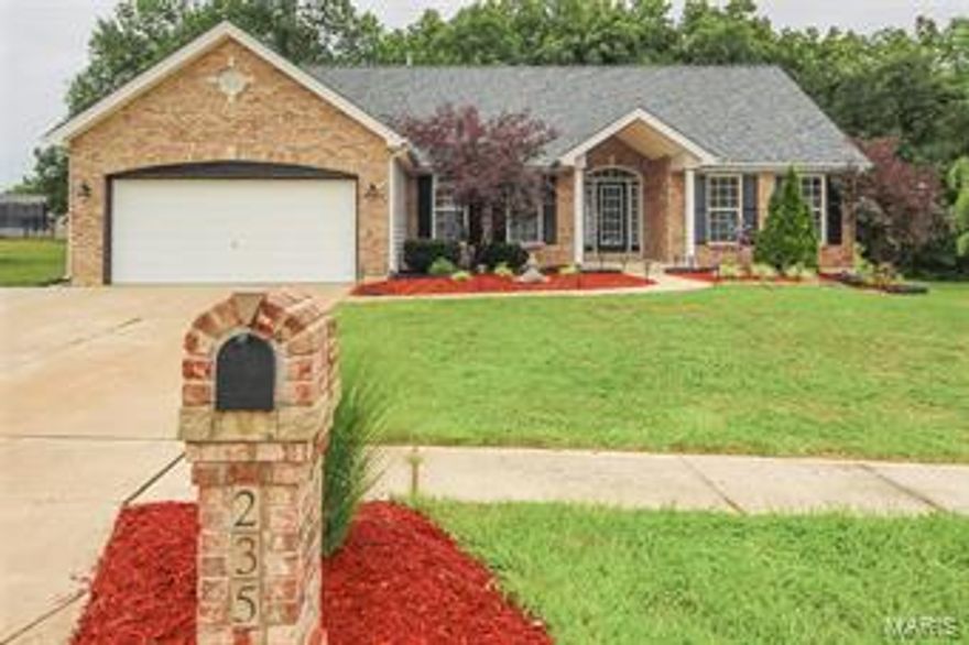 Welcome home to this gorgeous ranch on a quiet cul-de-sac.  On entry, you will be greeted by beautiful wood flrs flowing from the entry foyer, to the formal dining rm, great rm, the kitchen & hallway to the bedrooms. The kitchen has a planning desk, 42’ cabinets, gas range, breakfast bar & pantry.  Cozy up by the wood burning fireplace in the great rm while family & friend s gather in the breakfast rm & formal dining rm.  The master suite features, a walk-in closet, private bath with soaking tub, shower, dual vanity & a door leading to the backyard.  2 other bedrooms, full bath w/ dual vanity & laundry rm complete the main level.  You will love the lower level finish with 2 office/ sleeping  areas, work out rm, a massive rec rm with bar & ceramic tile flr & an updated full bathroom. Other features include: new roof in 2016, vaulted ceiling in the great rm & kitchen, split bedrm plan, backs to trees & lush landscaping.  Walking distance to School.  SELLER TO OFFER $1000 PAINT CREDIT.