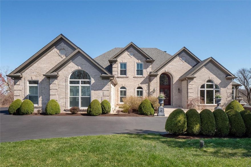 Beyond spectacular! This custom 1.5 story sits on 8 of the most gorgeous acres! Freshly updated throughout (2021) with an abundance of custom, top-of-line luxury amenities. Beautiful hardwood floors on the main floor & UL bedrms. 2 story entry, lovely curved staircase, large dining rm & study with built-ins. 2 story great rm features a gas fireplace, floor to ceiling windows to enjoy the views & a walk-behind wet bar. Stunning custom kitchen with quartz countertops, stainless appliances & adjoins the breakfast rm with access to the deck & hearth rm which has a stone fireplace. The spacious master suite boasts a beverage bar & see-thru fireplace to master bath which has his & her baths & closets. Amazing walkout lower level with rec rm, full kitchen, wine rm, 2nd walk-behind wet bar, bonus/exercise rm, bedrm, full bath & 2nd laundry rm. New roof, siding, custom front door, windows, deck & more! 4 car finished garage with private access to the lower level, circle drive, deck, & patios. Additional Rooms: Wine Cellar