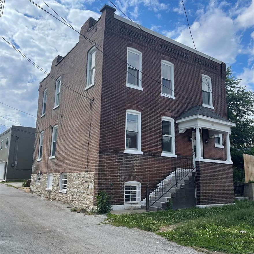 This all brick Two story home is awaiting your Special touches, New Window installed, has a 2 year old roof. This home has been a rental, With Potential income of $1600 a month as a one unit. This can be easily used for a 2 unit rental as well. Has 2 kitchens, with a full basement a full bath, This home is Located Just minutes from Downtown and the Brewery. A total of 3 bathrooms. This home can be lived in as is, or can be used to re-hap and gain your sweet equity.